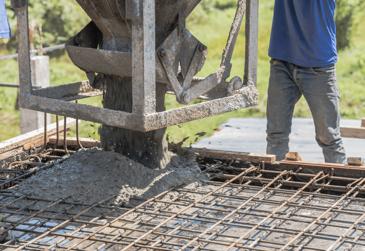 Pouring concrete on rebar foundation